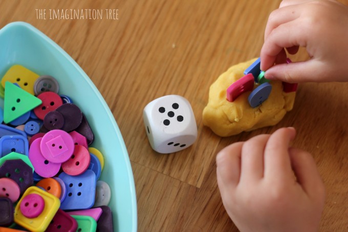 Counting with dice, play dough and buttons