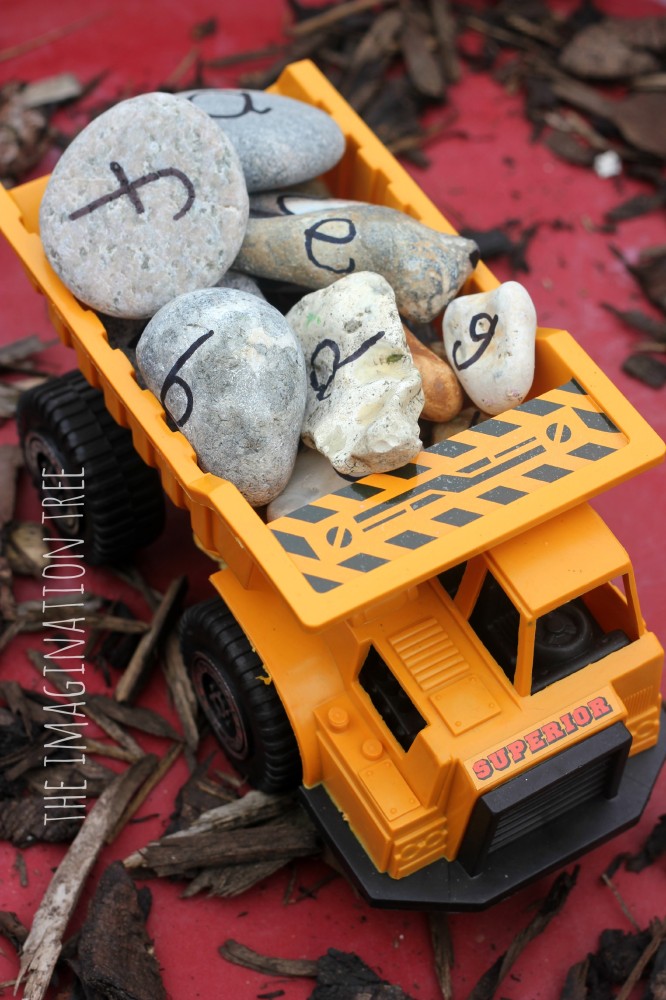 Alphabet rocks in a truck
