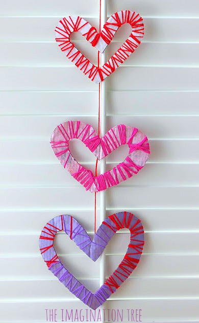 Yarn wrapped hearts mobile Valentine's day craft for kids