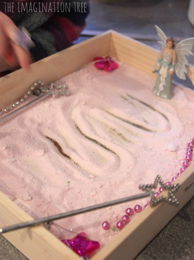 Mark making in fairy dust sensory tray