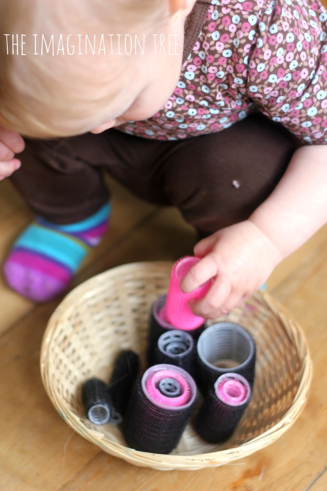 Baby sensory play activity with hair rollers