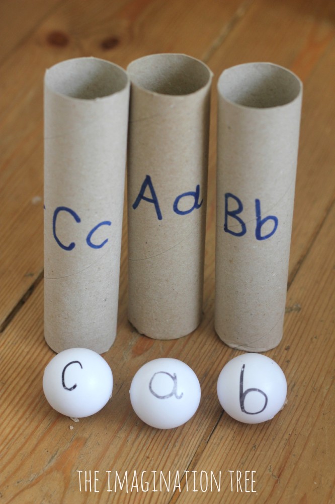 Literacy play with alphabet ping pong balls