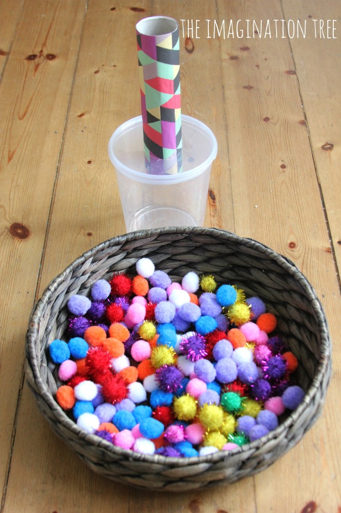 Pom pom drop and shoot game for toddlers