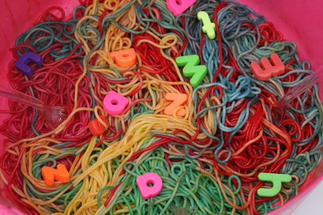 Rainbow alohabet spaghetti sensory play