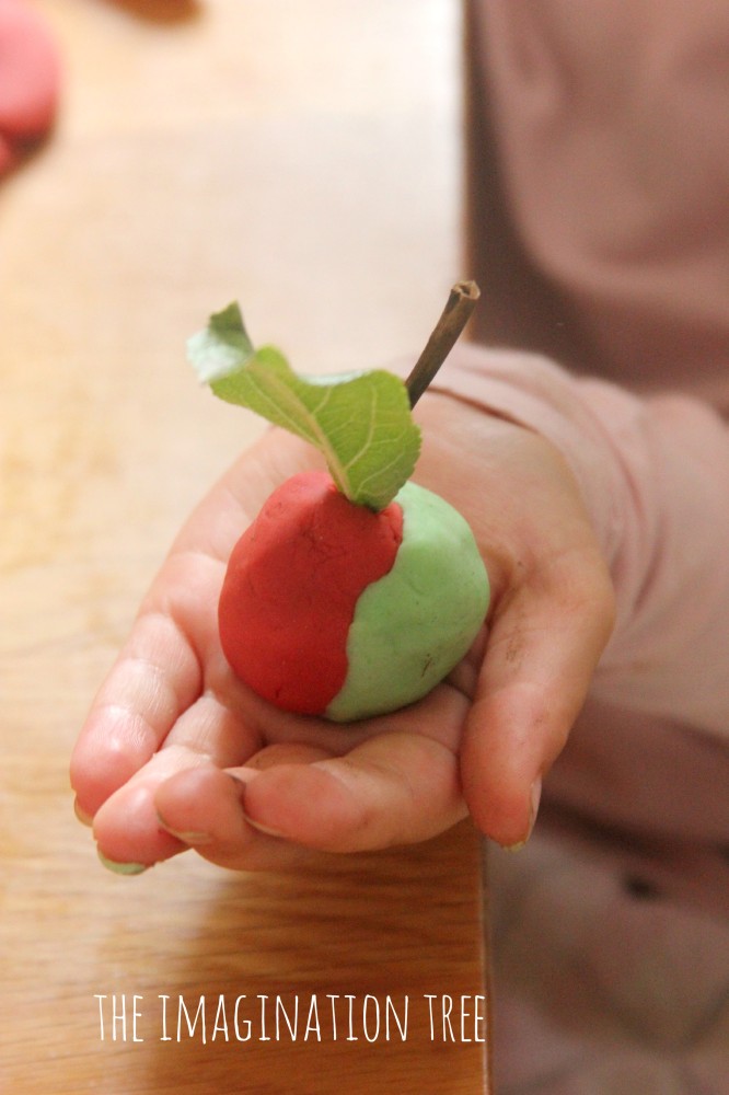 Making apples with apple scented play dough