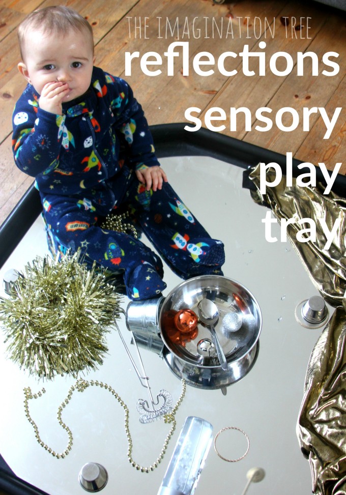 Baby heuristic play tray with reflective and metallic obejcts